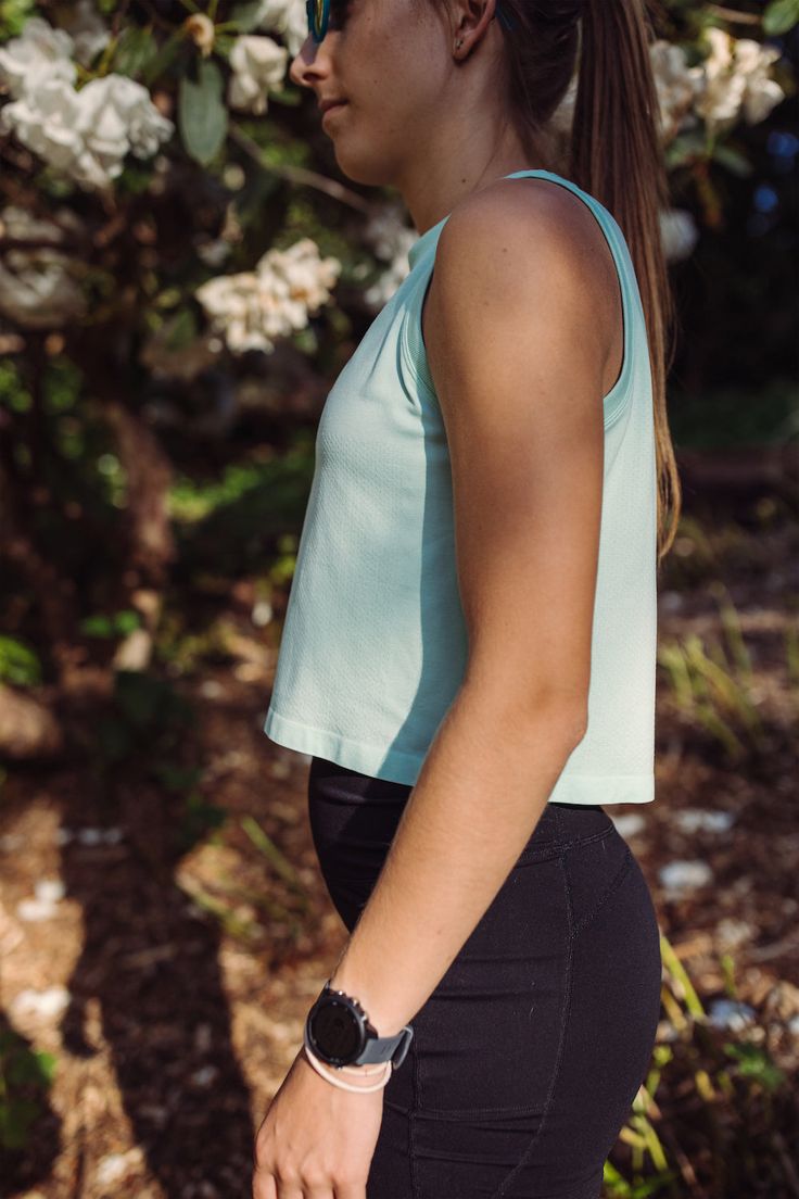 This tank is the perfect blend of comfort and style, ideal for workouts, running, or daily wear. Crafted from spandex and nylon, it offers just the right amount of stretch, making it your go-to favorite. The breathable, quick-drying fabric is also anti-bacterial, ensuring you stay fresh and comfortable all day long. 100% Nylon Model is 5'7" and 125 lbs wearing a Small/Medium Workouts Running, Mother Runner, 125 Lbs, Running Tanks, Running Tank Tops, Stay Fresh, Kids Pants, Workout Tank Tops, Track And Field