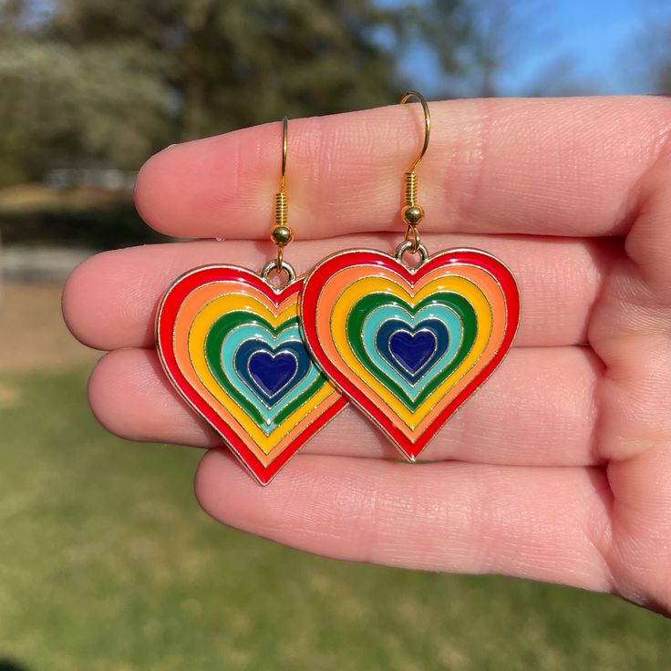 Pair of Red Rainbow Heart Dangle Earrings * Lightweight * Nickel Free and Hypoallergenic * Super cute and trendy Retro Rainbow Earrings For Gift, Retro Heart Earrings For Valentine's Day, Retro Heart-shaped Earrings For Valentine's Day, Retro Earrings For Valentine's Day Gift, Retro Hypoallergenic Earrings For Gift, Colorful Retro Earrings For Gifts, Colorful Retro Earrings For Gift, Multicolor Drop Earrings For Valentine's Day, Rainbow Retro Jewelry For Gift