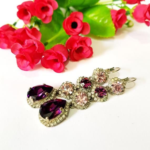 Purple Drop Chandelier Earrings For Formal Occasions, Purple Drop Crystal Earrings For Evening, Purple Crystal Drop Earrings For Evening, Glamorous Purple Jewelry For Evening, Vintage Purple Earrings For Party, Purple Party Earrings With Sparkling Stones, Purple Sparkling Stones Earrings For Party, Elegant Purple Crystal Earrings For Evening, Pink Elegant Clip-on Earrings For Anniversary