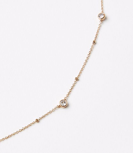 Luxuriously plated in 24kt gold and sparkling with cubic zirconia stones, this effortlessly dazzling necklace is an outfit finish to treasure forever. ,Imported:Imported Loft Demi Fine Scattered Pave Necklace Gold Women's by Loft Size Regular - One Size Gold Women's Necklaces, Jewelry Gold Delicate Chain Necklace With Cubic Zirconia, Dainty Diamond Necklace With Accents For Party, Dainty Diamond Necklace With Diamond Accents For Parties, Gold Cubic Zirconia Necklace In Fine Jewelry Style, Gold Cubic Zirconia Necklaces Fine Jewelry, Yellow Gold Crystal Necklace With Sparkling Stones, Gold Cubic Zirconia Fine Jewelry Necklace, Rose Gold Crystal Necklaces With Diamond Accents, Yellow Gold Sparkling Round Necklaces