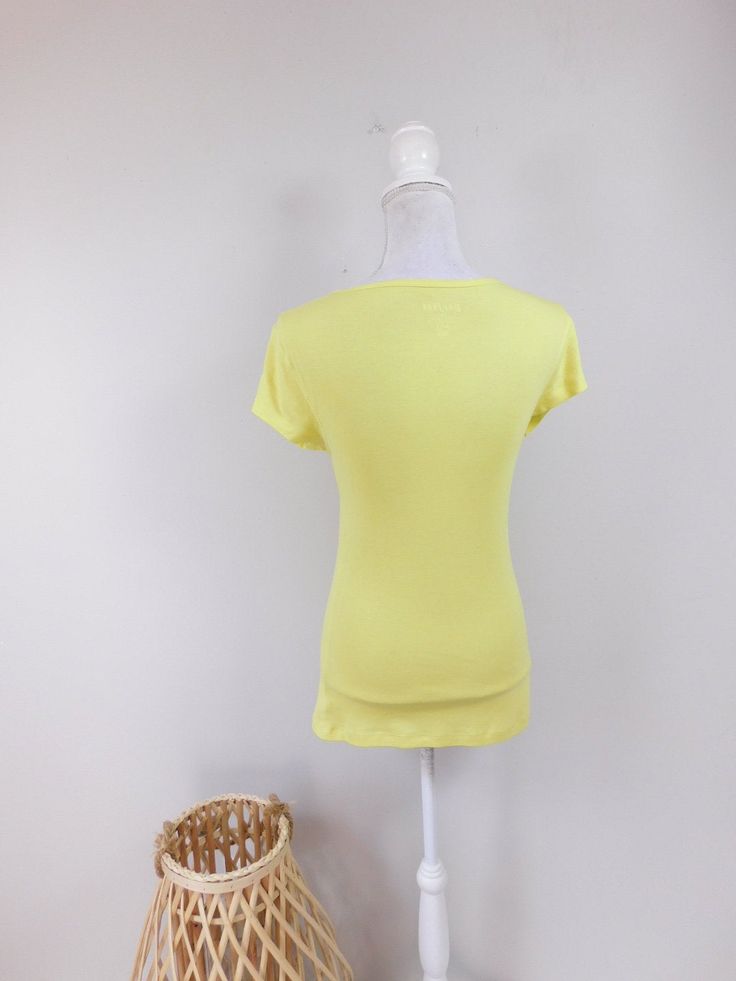 "Vintage 90s Neon Green Henley Clear Button Down V Neck Stretch Minimal Short Sleeve Top Blouse Tee Shirt Sz Medium This top is used but in good condition. Has no odors, tears. staining or repairs. Kept in smoke free environment. Brand: old navy This top measures: Bust: 34\" Waist: 30\" Hips: 36\" Top to bottom: 26\" (Measurements are taken across item laying flat and are then doubled.) Thanks for looking! Domestic Shipping: First Class (2-5 days) International Shipping: First Class (based on we Summer V-neck T-shirt With Button Closure, V-neck T-shirt With Button Closure For Summer, Summer V-neck T-shirt With Buttons, Summer T-shirt With Button Closure, Summer Crew Neck Blouse With Button Closure, Spring Short Sleeve T-shirt With Buttons, Spring Short Sleeve Button T-shirt, Fitted Short Sleeve T-shirt With Buttons, Spring Short Sleeve Buttoned T-shirt