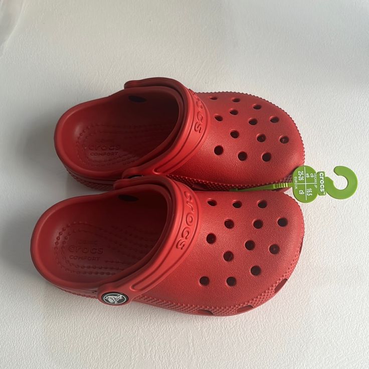 Color Red Classic Crocs Size C9 Brand New With Tag Solid Color Non-slip Closed Toe Clogs, Solid Non-slip Closed Toe Clogs, Non-slip Closed Toe Clogs, Red Non-slip Clogs With Round Toe, Red Slip-on Casual Clogs, Casual Red Slip-on Clogs, Red Non-slip Casual Clogs, Red Slip-on Synthetic Clogs, Red Closed Toe Synthetic Clogs