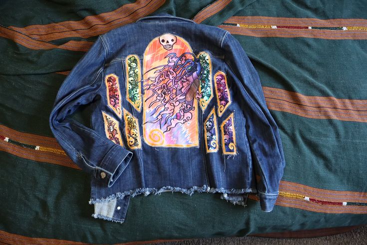 Denim Jacket With a picture of a monster woman jumping towards you while skeletons party behind sewn to the back.  this jacket is great for a breezy night out in the spring or in the summer, but can definitely be worn in the colder months with a warm sweater underneath for a cozy look! -If there is a size or style that is not listed here please send a message and I will try to help you find what you're looking for. - REFUND - I accept returns if they do not fit. You can get a Refund of the item (excluding shipping costs) if you mail it back. Monster Woman, Monster Skeleton, Woman Jumping, Skeleton Party, Warm Sweater, Warm Sweaters, Skeleton, Looks Great, Night Out