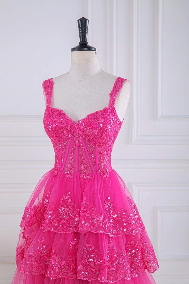 This fuchsia tulle ball gown is perfect for your special day. The sweetheart neckline, off the shoulder straps, and sheer corset bodice are all accentuated by elegant, shimmering sequin details. The tiered skirt and lace-up back provide a classic, timeless look and the perfect silhouette. ♡ SKU: FV12506 ♡ Shown Color: Fuchsia ♡ Fabric: Tulle ♡ Our dresses run true to size. ♡ Besides stand size 2-16, we still offer free custom size, which requires the next size: Bust:___ inch/cmWaist:___ inch/cmH Pink Lace Ball Gown With Sweetheart Neckline, Pink Ball Gown With Lace Bodice And Sweetheart Neckline, Pink Gown With Sweetheart Neckline And Fitted Bodice, Sweetheart Neckline Ball Gown For Debutante Ball And Prom, Fitted Pink Ball Gown With Sweetheart Neckline, Pink Gown With Sweetheart Neckline For Debutante Ball, Pink Ball Gown With Corset Back For Quinceanera, Pink Gown With Sweetheart Neckline For Prom, Pink Gown With Lace Bodice For Quinceanera