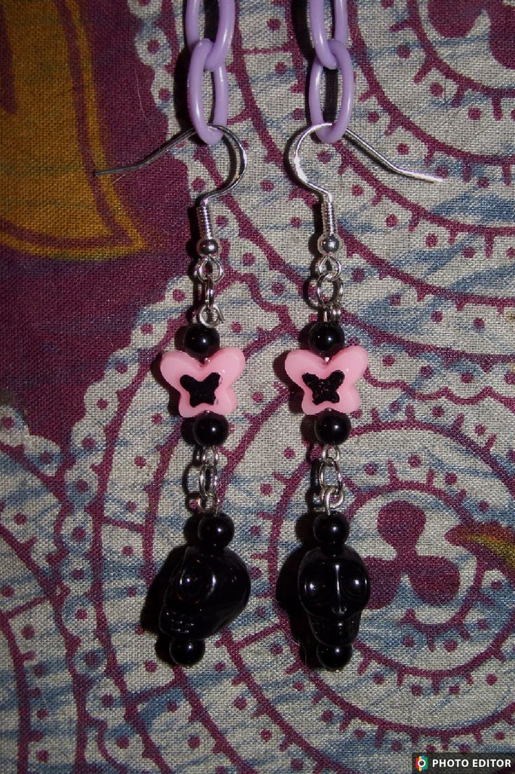 Handmade black and pink skull beaded earrings Edgy Adjustable Pink Jewelry, Adjustable Edgy Pink Jewelry, Black Skull-shaped Earrings With Skull Print, Nickel-free Black Emo Jewelry, Edgy Pink Party Jewelry, Black Gothic Earrings With Skull Print, Edgy Black Beaded Jewelry, Adjustable Black Skull-shaped Earrings, Adjustable Black Skull Earrings