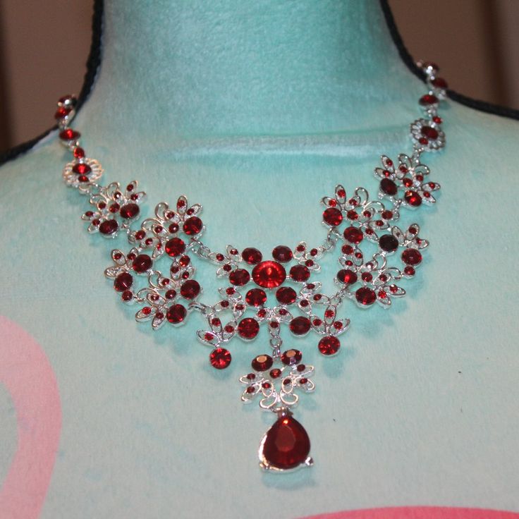 Nwt: Lace Looking Necklace With Red Rhinestone Flower In The Center, It Is Silver Tone, It Has A Large Teardrop Red Rhinestone Hanging From The Center Of The Necklace, It Is 3" Tall From The Top To The Bottom, 18" Long Chain Red Rhinestone Necklace For Party, Red Rhinestone Party Necklaces, Elegant Red Rhinestone Necklace, Red Teardrop Necklace For Party, Elegant Red Rhinestone Necklace For Formal Occasions, Elegant Red Rhinestone Necklace For Formal Events, Red Jeweled Crystal Necklace, Elegant Red Rhinestone Necklaces, Red Rhinestone Necklace For Gift