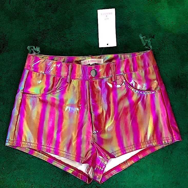 Brand New With Tags Still Attached. Super Cute High Waisted Pink Shorts Made From Vegan Faux Leather. Made By The Brand Hot & Delicious & Bought From Dolls Kill. Features An Iridescent Finish All Over, Belt Loops, A Zip Up Fly With A Button Closure, & Pockets On The Front Sides. See Pictures For Details. Note: The Color Differences In The Pictures Is Due To Different Lighting *Completely Out Of Stock On The Dollskill Website!* Tags: Sexy Cool Cute Women’s High Waist Metallic Shorts Festival Edm Iridescent Stretch Bottoms For Summer, Fitted Shiny Shorts For Summer, Disco Style Stretch Summer Shorts, Shiny Summer Shorts, Metallic Disco Shorts For Summer, Purple Party Shorts, Spring Rave Bottoms For Night Out, Shiny Stretch Bottoms For Summer, Rave Style Bottoms For Spring Night Out