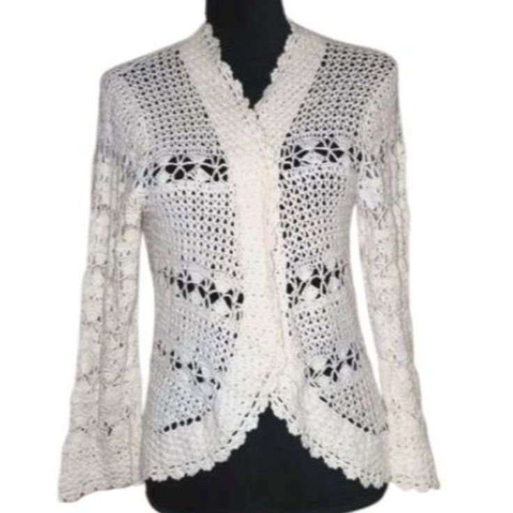 Crochet/Knitted, One Of A Kind Sweater. High Fashion. Absolutely Stunning And One Of Kind! New, In Perfect Condition. Size: Womens Us 12 Condition: New Without Tags Elegant Fitted Knitted Sweater, Elegant White Fitted Cardigan, Elegant White Crochet Knit Top, Elegant Fall Crochet Top, Elegant White Knitted Outerwear, Elegant Long Sleeve Crochet Top With Pointelle Knit, Elegant Long Sleeve Pointelle Crochet Top, Elegant Beige Fitted Crochet Top, Elegant Long Sleeve Open Knit Sweater