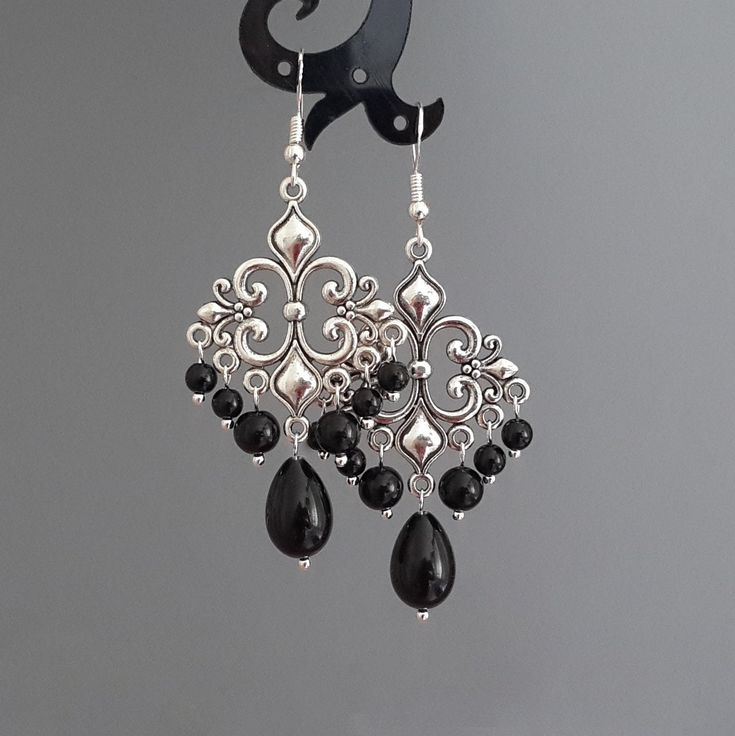 "Length: approx. 68mm (2 5/8\") Width: approx. 30mm (1 1/4\") Made of Tibetan Silver, 925 sterling silver hooks, Czech glass pearls" Black Gem Earrings, Victorian Black Earrings For Party, Black Elegant Chandelier Earrings, Nickel Free, Victorian Black Dangle Earrings, Black Victorian Dangle Earrings, Elegant Metal Earrings For Halloween, Gothic Black Drop Earrings, Elegant Metal Halloween Earrings, Elegant Black Chandelier Earrings With Ear Wire