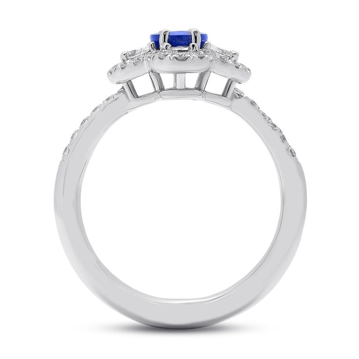 An impressive, brilliant sapphire sits at the helm of this masterfully designed ring. Four, specially cut half moon shaped diamonds are set at the north, south, east and west points of the center stone and are traced by a halo of petite diamonds. Whether it may be a gift to yourself, an engagement or wedding this jewel is a quintessential family heirloom. Metal: 18kt Gold Sapphire Weight: 0.95 ct. Half Moon Diamond Weight: 0.27 ct. Round Diamond Weight: 0.38 ct. Measurements: 14.0 mm length x 12 Marquise Cut Sapphire Diamond Ring With Center Stone, Celestial Sapphire Ring With Diamond For Anniversary, Celestial Style Sapphire Ring With Diamond For Anniversary, Sapphire Marquise Ring With Halo Setting, Celestial Diamond Ring With Center Stone, Sapphire Diamond Ring With Marquise Brilliant Cut, Sapphire Rings With Marquise Halo Setting, Sapphire Marquise Brilliant Cut Ring, Cluster Sapphire Diamond Ring With Halo Setting