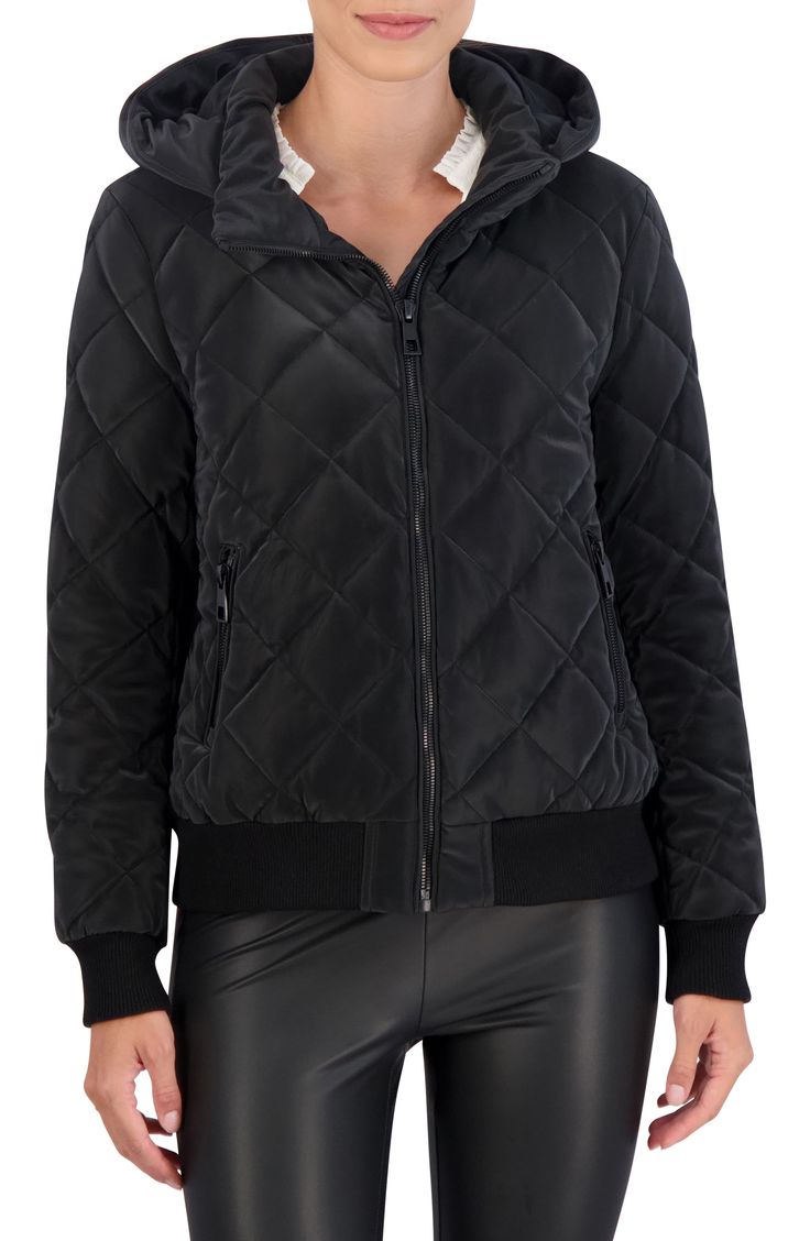 Stay warm in this water-resistant quilted bomber jacket constructed with an attached hood, secure zip pockets and comfortable ribbed trim. Front zip closure Fixed hood Front zip pockets Lined, with synthetic fill 100% polyurethane with 100% polyester backing Machine wash, line dry Imported Model stats: 5'10" height, 32" bust, 25" waist, 36" hip. Model is wearing size Small. Jacket Sale, Knit Cuff, Stay Warm, Nordstrom Rack, Blazer Jacket, Parka, Ribbed Knit, Zip Pockets, Comfort Fit