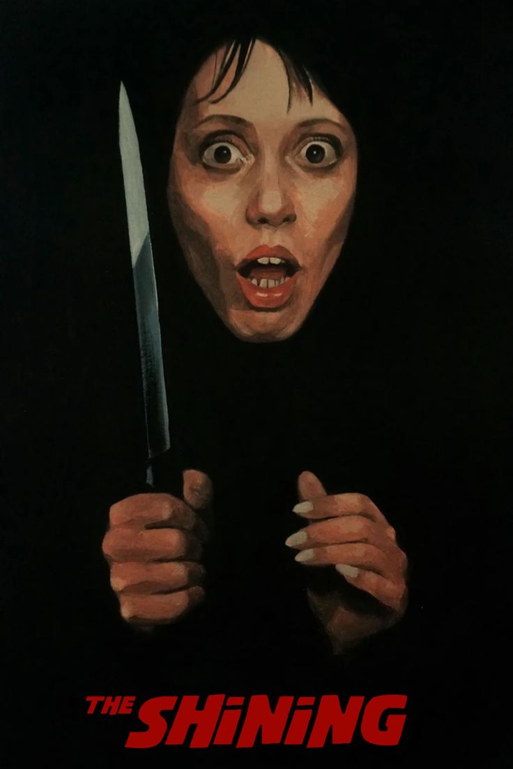 the shining horror movie poster with a woman holding a knife in front of her face