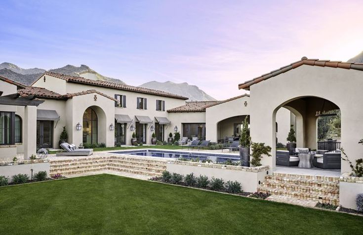 a house with a pool in the front yard