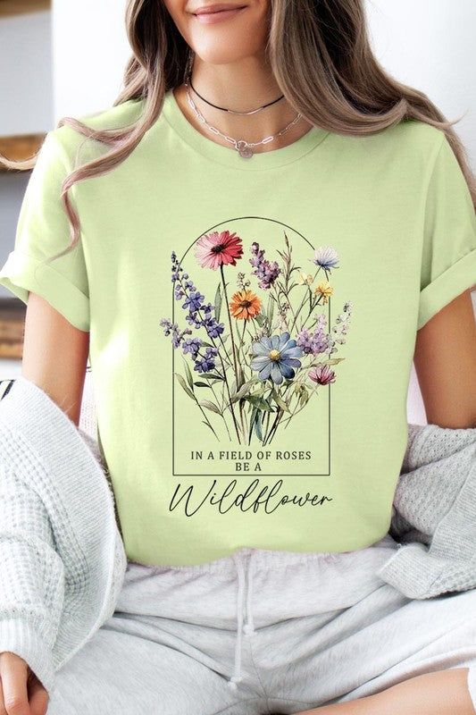 Field of Roses Be A Wildflower Floral Meadow Graphic T Shirts.Unisex Crew Neck Short Sleeve Tees.Crafted from premium materials, tailored to your lifestyle, ensuring a comfortable fit for any occasion.Family Group Uniforms Birthday Party Gift Concert Festival Events.High Quality Direct To Film Printed Graphic Design.100%COTTON,HEATHER(52%COTTON,48%POLY),ATH.HEATHER,BLACK HEATHER(90%COTTON,10%POLY)NICARAGUAMade In: Nicaragua Be A Wildflower, Field Of Roses, Floral Meadow, Concert Festival, Film Prints, Graphic Design Print, Birthday Party Gift, Spring Shirts, Spring Green