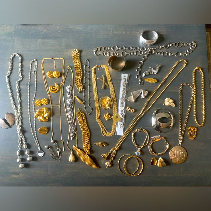 Beautiful Lot Of Mostly Vintage And A Few Modern Gold And Silver Ton Jewelry Pieces. Crown Trifari, Sarah Coventry, Avon, Napier, Monet, Don Lin- Signed And Unsigned Pieces. 40 In All: 16 Brooches, 10 Bracelets, 9 Necklaces, 5 Pair Of Earrings And A Belt. Thanks! All In Good Vintage Condition. Quiet Luxury Jewelry, Streetwear Jewelry, Pottery Inspo, Trifari Jewelry, Mixed Metal Jewelry, Crown Trifari, Sarah Coventry, Coventry, Mixed Metals