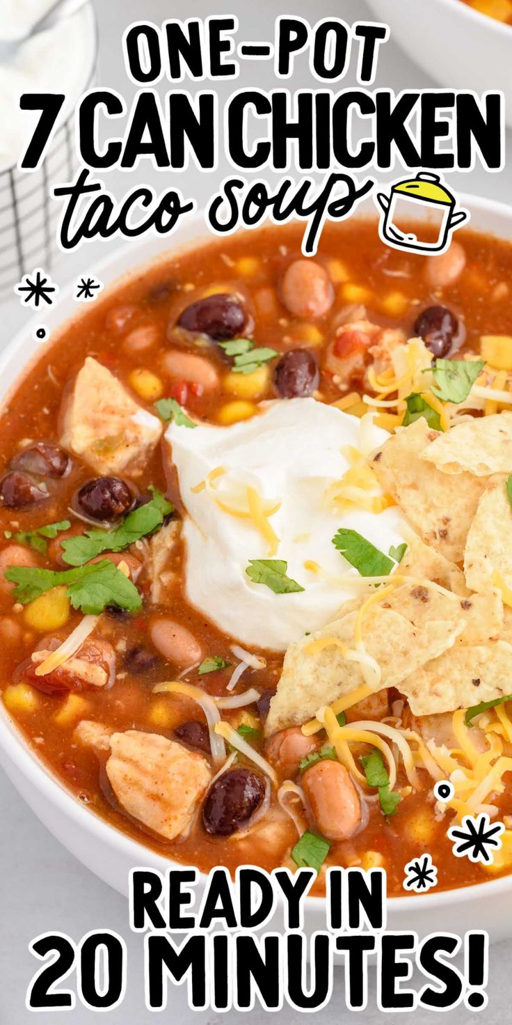 a bowl of chicken taco soup with tortilla chips and sour cream on top