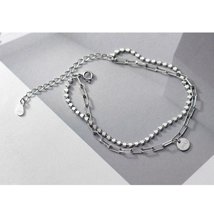 This Double Chain Disk Bracelet is a modern style bracelet with anti-allergic and durable finish that makes it blend with any outfit. Trendy Sterling Silver Chain Bracelet, Trendy Jubilee Chain Link Bracelet, Trendy Sterling Silver Chain Link Bracelet, Trendy Stainless Steel Box Chain Bracelets, Trendy Stainless Steel Box Chain Bracelet, Trendy Bracelets With Box Chain Link, Trendy Sterling Silver Link Chain Bracelet, Modern Silver Chain Bangle Bracelet, Trendy Silver Chain Bracelet For Everyday