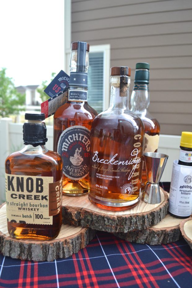 several bottles of alcohol sitting on top of a table