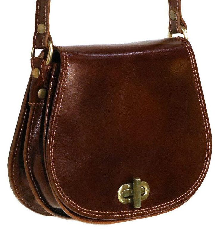 leather saddle cross body bag floto Classic Brown Saddle Bag With Adjustable Strap, Classic Brown Saddle Bag With Removable Pouch, Brown Vegetable Tanned Leather Bag For Formal Occasions, Formal Brown Vegetable Tanned Leather Bag, Classic Crossbody Saddle Bag With Leather Handles, Cognac Saddle Bag With Removable Pouch, Classic Leather Crossbody Saddle Bag, Cognac Saddle Bag With Leather Lining, Classic Leather-handled Crossbody Saddle Bag