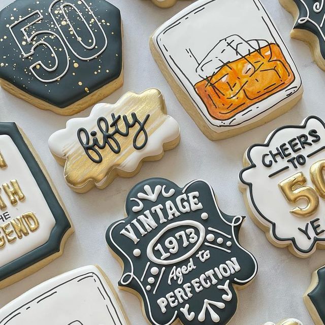 decorated cookies are displayed on a table for celebrating 50 years in the united states,