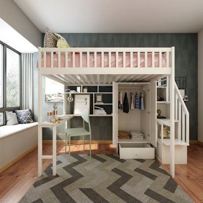 a loft bed with desk underneath it in a room that has hardwood floors and windows