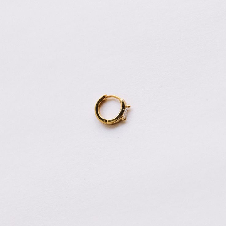 ~Sold as 1 earring ~Made with thick 18k gold plated on sterling silver~Set with brilliant white AAA grade diamond simulant~Inner Hoop diameter: 8mm~Outer Hoop diameter: 10 mm~Nickel Free & Lightweight, perfect for everyday wear Classic Small Hoop Gold Piercings, Gold Small Hoop Classic Piercings, Classic Gold Small Hoop Piercings, Classic Hoop Piercings, Tarnish Resistant, Classic Tarnish Resistant Hoop Piercings, Classic Tarnish-resistant Hoop Piercings, Gold Diamond Hoop Piercings, Gold Diamond Round Cut Piercings, Classic Gold Round Cut Piercings