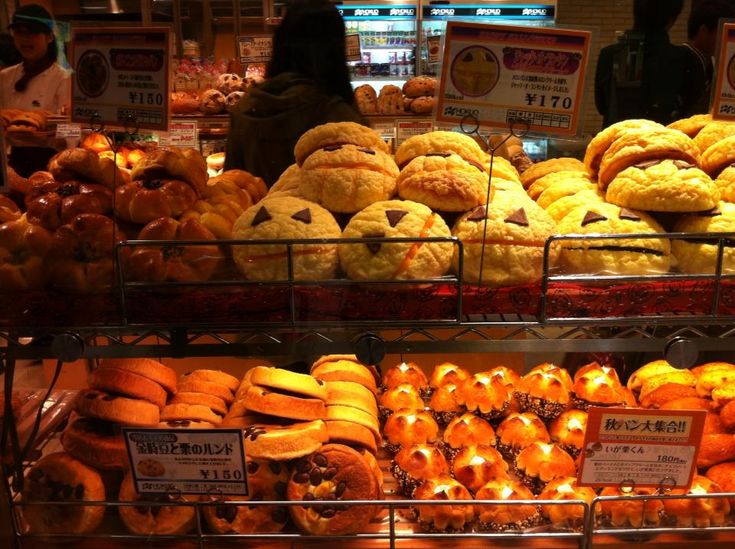 many different types of baked goods on display