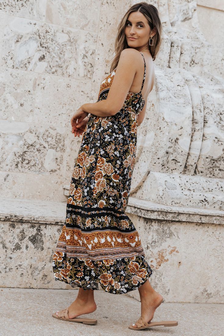 Black Retro Boho Floral Tassel Tie Maxi Dress Black Boho Dress With Print For Vacation, Black Bohemian Dress With Boho Print, Black Boho Print Maxi Dress, Casual Festival Dress With Back Tassel Tie-up, Black Bohemian Sundress For Vacation, Bohemian Black Maxi Dress With Floral Print, Bohemian Black Floral Print Maxi Dress, Black Boho Print Maxi Length Dress, Casual Black Dress With Tassels