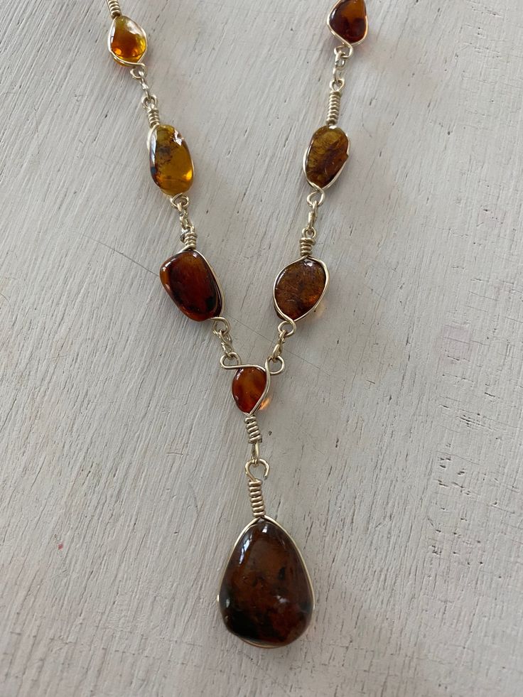 A handmade amber stone necklace made with 925 sterling silver wire.  Length 22 inch can be adjusted Nautical Accessories, Wire Design, Amber Stone, Vintage Purse, Leather Necklace, Silver Wire, Stone Necklace, Vintage Leather, Jewelry Pieces