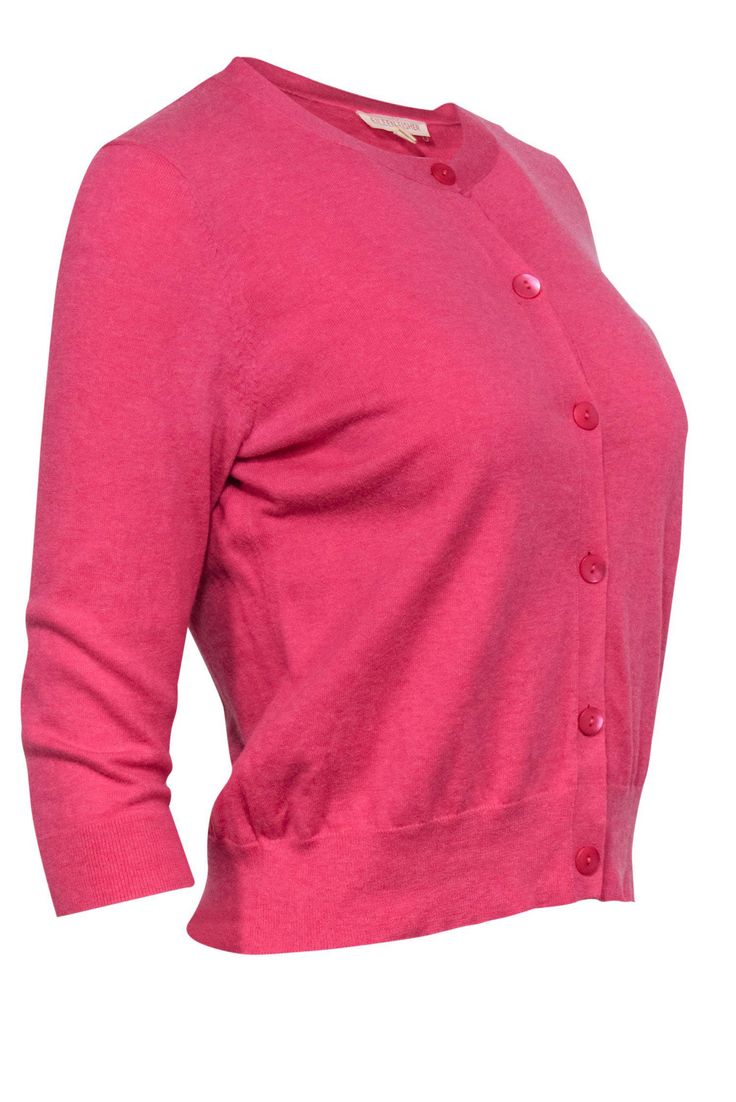 Go for that lovely layered look this spring with this adorable cardigan from Eileen Fisher! Made in a soft cotton cashmere blend and a precious pink hue, this button-up beauty is perfect for Easter or having drinks with friends on the patio. Pair with a floral dress and wedges for a garden-party-glam ensemble. Size XS 85% Organic Cotton, 15% Cashmere Front button-up closure Round neckline Quarter sleeve Bust 36" Waist 34" Sleeve length 15" Shoulder to hem 20.5" Classic Pink Fine Knit Sweater, Classic Fine Knit Pink Sweater, Elegant Pink Sweater For Layering, Classic Fitted Pink Cardigan, Fitted Classic Pink Cardigan, Pink Fine Knit Sweater For Workwear, Classic Pink Sweater For Spring, Elegant Pink Sweater With Button Closure, Pink Cotton Button-up Cardigan