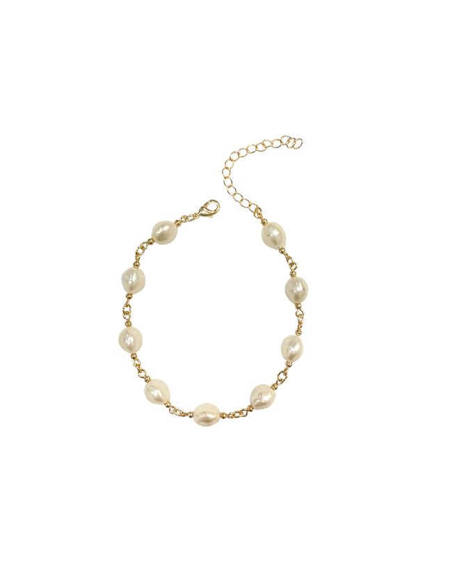 An 18K Gold Filled Chain Cracelet with Pearls. Length: 6" with 2" extender Adjustable Gold Pearl Chain Bracelet, 14k Gold-filled Pearl Charm Bracelet, 14k Gold Filled Pearl Charm Bracelet, Adjustable Chain Bracelet With Pearl Drop, Adjustable Pearl Drop Chain Bracelet, Everyday Pearl Bracelet With Adjustable Chain, Gold Pearl Bracelet With Extender, White 14k Gold-filled Bracelets With Pearl Chain, White 14k Gold Filled Pearl Chain Bracelets