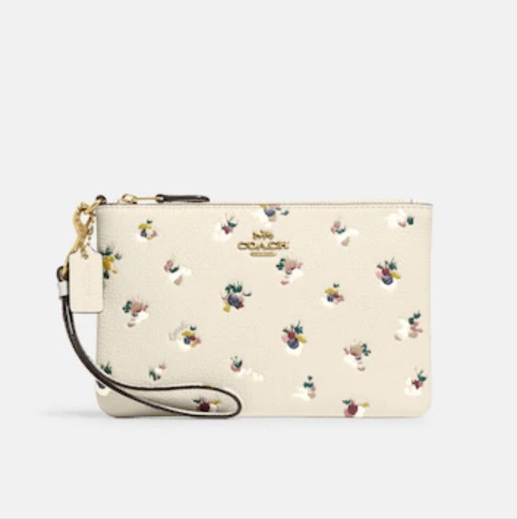 Polished Pebble Leather And Nappa Leather Two Credit Card Slots Zip-Top Closure, Fabric Lining Detachable Wrist Strap 7 1/2" (L) X 4 3/4" (H) X 1/2" (W) Fits An Iphone Or Android Style No. C5997 Cream Clutch Pouch, White Wristlet For Daily Use In Spring, White Rectangular Clutch For Spring, White Zipper Pouch, White Pouch Wristlet With Wrist Strap, White Zipper Pouch Wristlet, White Clutch Wristlet With Wrist Strap, White Wristlet Clutch With Wrist Strap, White Clutch With Wrist Strap For Everyday Use