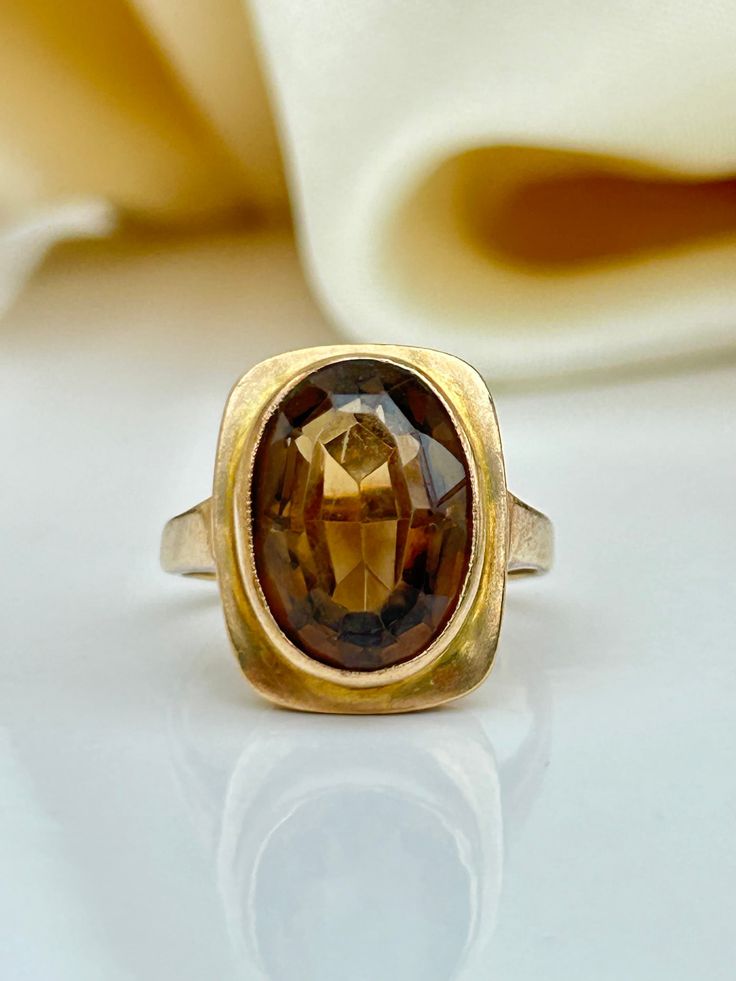 Vintage 9ct Gold Citrine Cocktail Ring  Gorgeous citrine cocktail ring, truly wonderful The item comes without the box in the photo but will be presented in a Gembank1973 gift box Measurements: weight 4.50g, size UK L US 6, head of ring 16mm x 12mm, height off finger 7mm Materials: 9ct gold and citrine  Hallmarks: stamped 9.375 Condition: the overall condition is very good Office use: UDZ Vintage Cocktail Ring, Costume Jewelry Rings, Dream Engagement, Dream Engagement Rings, Citrine Ring, Ring Pictures, Jewelry Inspo, Cocktail Ring, Cocktail Rings