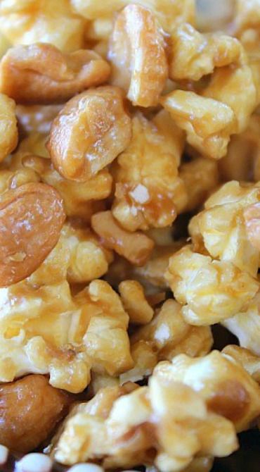 close up view of nuts and raisins on a plate