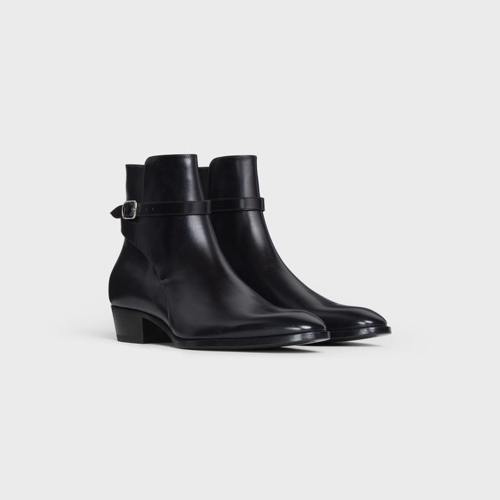 CELINE DRUGSTORE JODHPUR BOOT in Shiny calfskin - Black | CELINE Luxury Business Boots For Fall, Luxury Boots For Business In Fall, Classic Boots With Branded Heel Counter And Snip Toe, Classic Snip Toe Boots With Branded Heel Counter, Luxury Chelsea Boots With Leather Sole And Pointed Toe, Fitted Calf Leather Moto Boots With Leather Sole, Designer Formal Winter Boots, Designer Business Chelsea Boots For Fall, Designer Chelsea Boots For Business In Fall