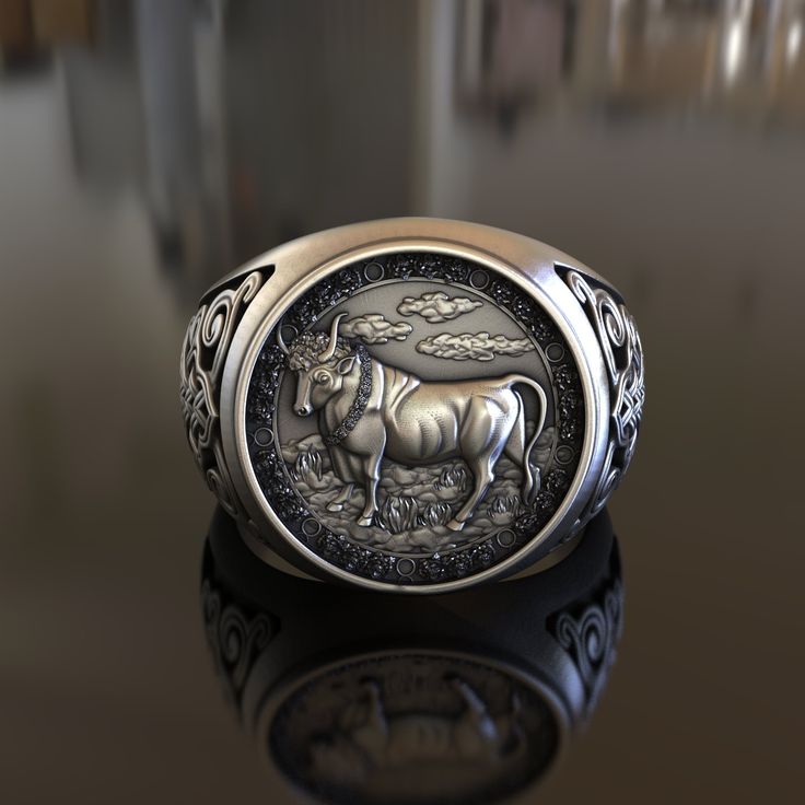 Experience the mystique of the zodiac with our Handcrafted 925 Sterling Silver Taurus Zodiac Ring. This meticulously crafted ring showcases the Taurus Zodiac symbol, infusing a distinctive personal touch into your jewelry collection. Crafted from superior quality 925 Sterling Silver, this ring promises enduring shine and durability. It is designed to stand up to daily wear and still maintain its beautiful luster, making it a cherished piece of your accessory collection for years to come. This un Silver Zodiac Sign Jewelry For Anniversary, Symbolic Zodiac Sign Collectible Jewelry, Symbolic Zodiac Sign Jewelry, Symbolic Zodiac Sign Rings, Round Zodiac Sign Jewelry Collectible, Collectible Round Zodiac Sign Jewelry, Mythological Style Round Jewelry Gift, Silver Zodiac Sign Ring, Silver Zodiac Sign Rings For Gift