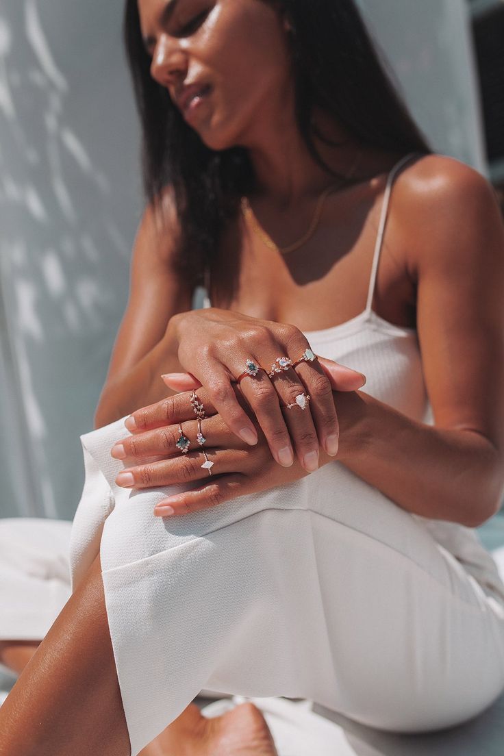 Filled with graceful and delicate features, our Ethereal ring is too perfect for words. Set in rose gold, this piece holds a beautiful moonstone crystal as the main focus and white floral crystals fluttering along the band Ring Details Design: Lilac moonstone crystal with white side crystals Dimensions: 11mm height Metal: 3x dipped 14k rose gold over hypoallergenic brass. High quality plating details below Crystals: Exclusive Oomiay glass crystal, 5A grade Oomiay cubic zirconia crystals Gold Dainty Ring, Plating Techniques, Delicate Features, Moonstone Crystal, Crystal White, White Crystals, Gold Piece, Purple Crystals, Affordable Jewelry