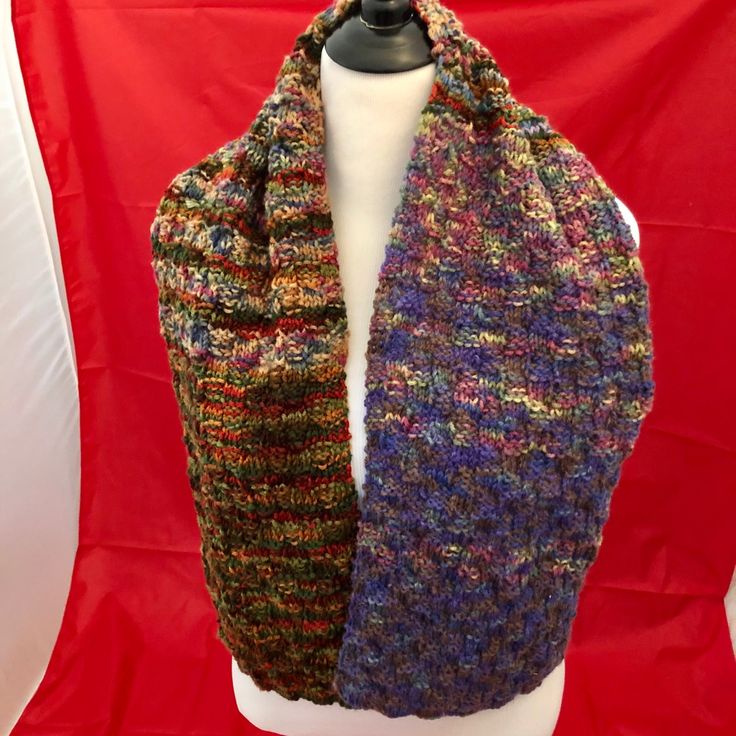 Hand Knit Arcrylic Scarf, Approximately 52 Inches Long. This Gorgeous Artistic Scarf Has Two Distinct Halfs With A Warm And Cool Color Contrast. On The Cool Side Blue & Purple Dominate. On The Warm Side Dominant Colors Are Red, Rust & Dark Green. Beautiful Variegated Yarns! New Without Tags. Fall Acrylic Yarn Knitting Pattern, Winter Acrylic Knitting Pattern, Multicolor Knit Pattern For Winter, Brown Hand Knitted One Size Knitting Pattern, One Size Brown Hand Knitted Pattern, One Size Hand Knitted Brown Knitting Pattern, Fall Knitting Pattern For Cold Weather In Acrylic, Fall Acrylic Knitting Pattern For Cold Weather, One Size Acrylic Scarves For Fall