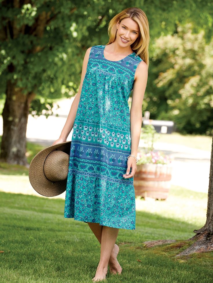 Keeping your cool this summer is a breeze in this lightweight sleeveless lounge dress. With gently gathered tiers for an unrestricted fit and an eyeful of style—this 100% cotton dress is ideal for backyard barbecues, strolling in the park, or relaxing at home. Wear with a slip for full coverage. 100% woven cottonGently gathered tiers for a loose flowing fitSide-seam pocketsApprox. 46" longPatterns may varyAvailable in both Women's Plus sizesMachine wash and dryImported Comfortable Spring Daywear Dresses, Comfortable Daywear Dresses For Spring, Comfortable Spring Vacation Dresses, Comfortable Summer Daywear Dresses, Comfortable Blue Spring Dresses, Casual Cotton Dresses For Warm Weather, Comfortable Sleeveless Spring Dresses, Floral Dress Outfits, Vermont Country Store