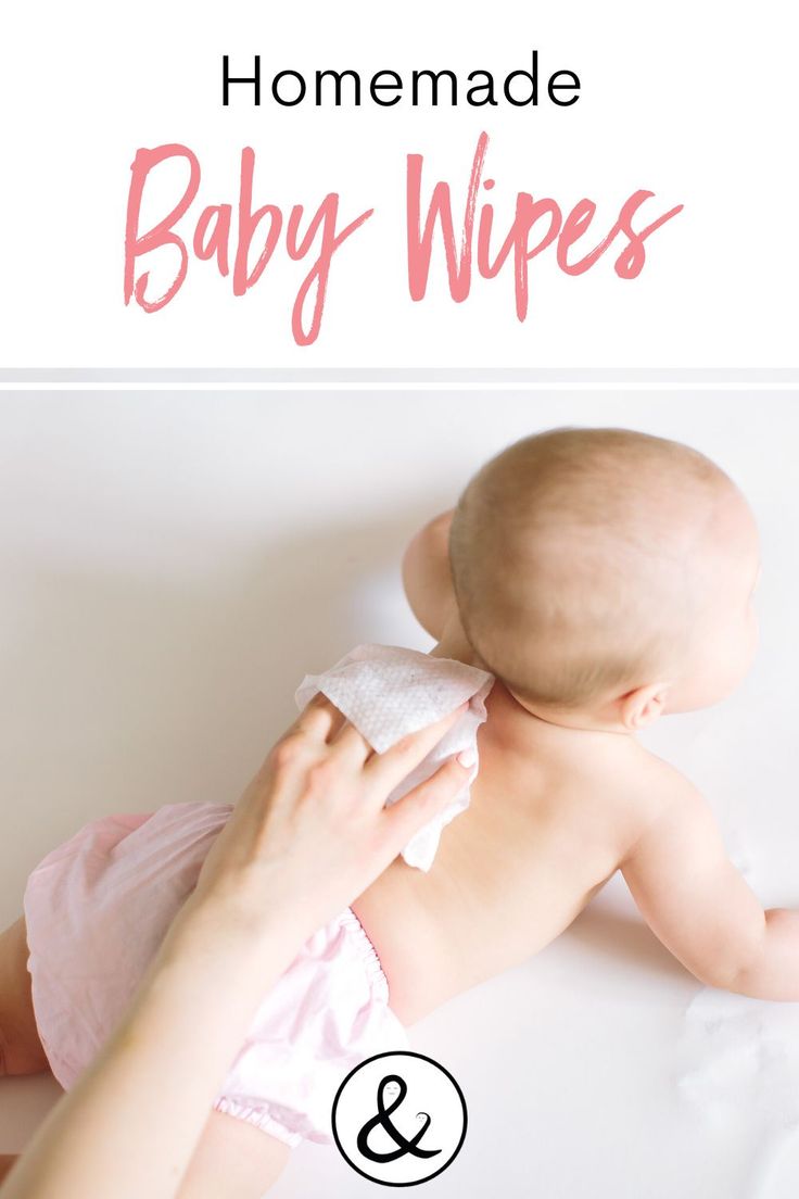 a woman holding a baby in her arms with the words homemade baby wipes on it