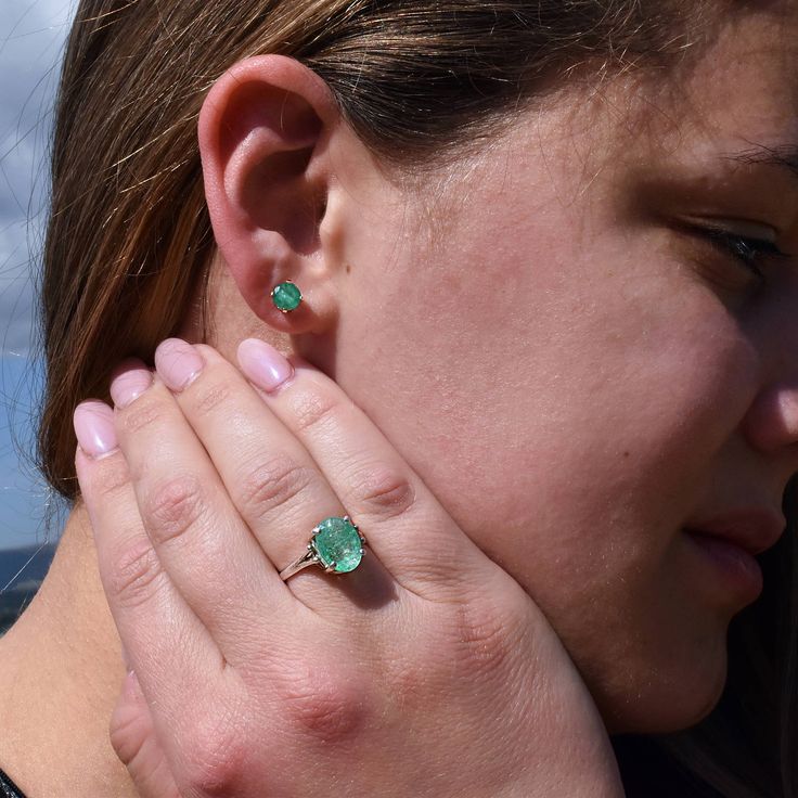 "Genuine Rustic Emerald stud earrings DESCRIPTION These Rustic Emeralds are stunning with gorgeous translucent green color and beautiful rustic markings. Elegantly Set in your choice of high quality 14k Solid Gold or 925 Sterling Silver studs. We love this setting because it lets light in from every angle for maximum sparkle effect.Truly striking and goes with everything. Please allow 1-2 weeks processing time for 14k Gold Option of these earrings. DETAILS * Genuine, Colombian Emeralds * 5mm fac Green Prong Setting Earrings In Fine Jewelry Style, Green Emerald Earrings With Prong Setting, Green Birthstone Earrings, Green Round Earrings With Prong Setting, Simple Studs, Emerald Stud Earrings, Earrings Emerald, Emerald Earrings Studs, Studs Gold