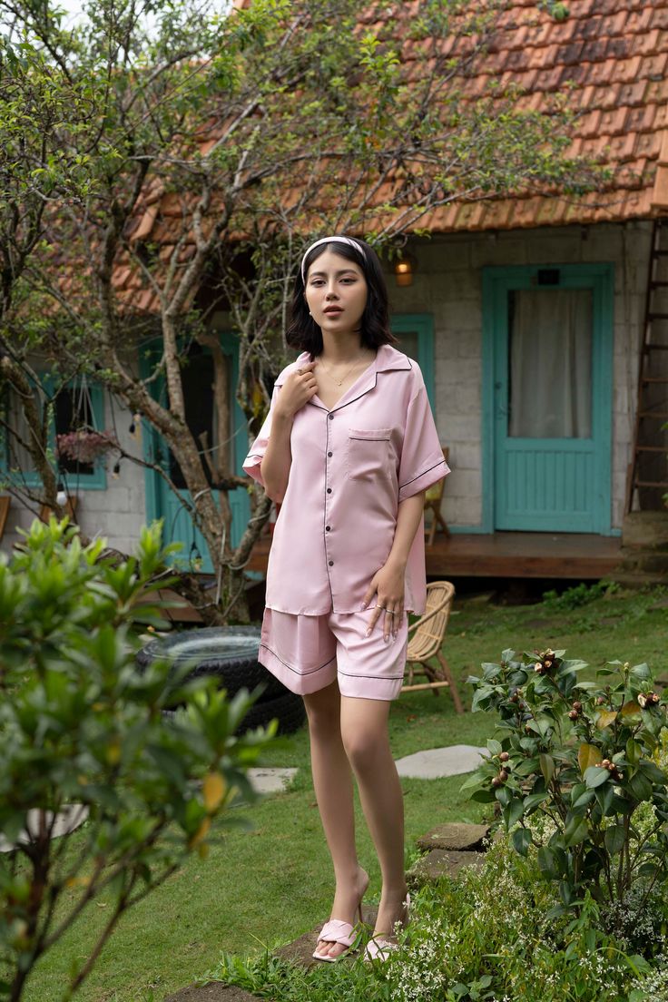 Short Sleeve Silk Set - Pink - Classic Set - Relaxed Fit A classic set on elegant short sleeved matching soft silk pyjamas, Mila Set is a lasting pair featuring contrasting-colour piping detail and an adjustable waistband for comfort and style. And you can wear this set everywhere This pyjama set is made from soft, lightweight French Silk, this set consists of a fluid top with contrasting coloured buttons and adjustable short. Beautifully tailored from luxurious silk, the Mila Silk Sets are giving you continue a enjoyable body temperature and a perfect night's sleep. * Only 1 size - Free sizes, up to XL size * Beautifully tailored with plain colour. * Hand wash highly recommended (Please refer to Washing and Care Instruction) * Soft and gentle to your skin * Designed in Australia. * Non cr Spring Sleepwear Sets With Short Sleeves, Elegant Short Sleeve Loungewear Sets, Spring Short Sleeve Sleepwear Set, Feminine Summer Sets With Short Sleeves, Feminine Short Sleeve Summer Set, Solid Color Short Sleeve Sleepwear For Summer, Casual Sets For Summer Nights, Elegant Short Sleeve Relaxed Fit Sleepwear, Pink Short Sleeve Home Sets