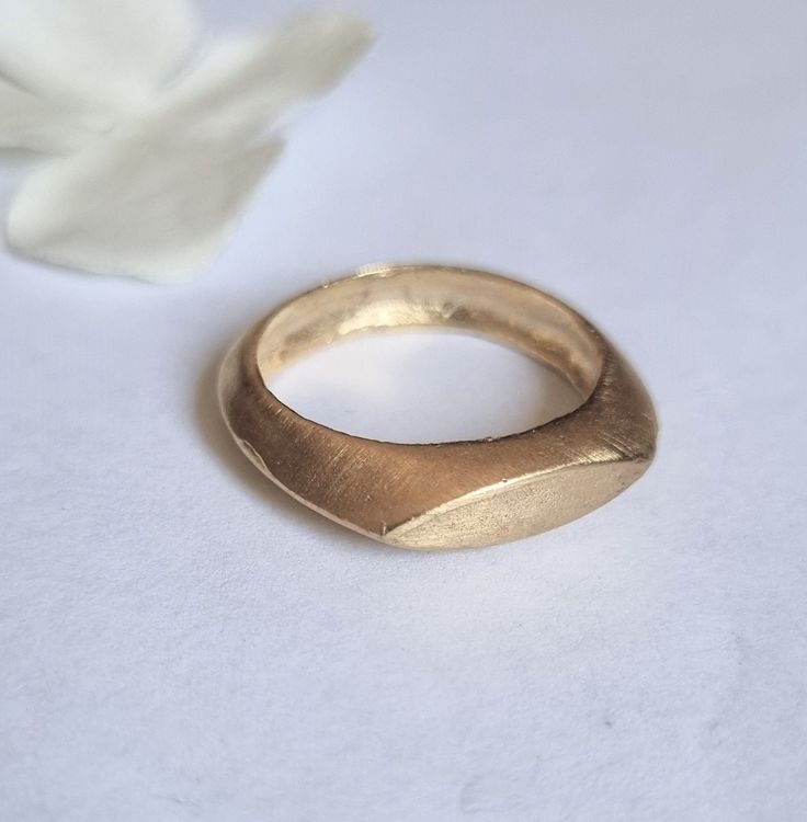 "Classic signet ring in a marquise design, dainty minimalist pinky ring jewelry for women, available in 14k gold plating or sterling silver. This delicate handmade gold ring is elegant and minimalist. It was made by carving wax and casting it into metal.  It is available in high-quality 14k gold plating or sterling silver. This ring is very comfortable to wear and great for everyday use, and will never go out of style. It can also be a great pinky ring. Get this timeless signet ring- you'll neve Wax Carved Signet Ring, Modern Minimalist Jewelry, Gold Marquise Stackable Rings, Dainty Style, Fine Jewelry Marquise Gold Rings, Dainty Marquise Gold Stackable Rings, Dainty Marquise Cut Yellow Gold Rings, Fine Jewelry Gold Marquise Stackable Rings, Gold Marquise Stackable Rings Fine Jewelry, Gold Marquise Stackable Rings