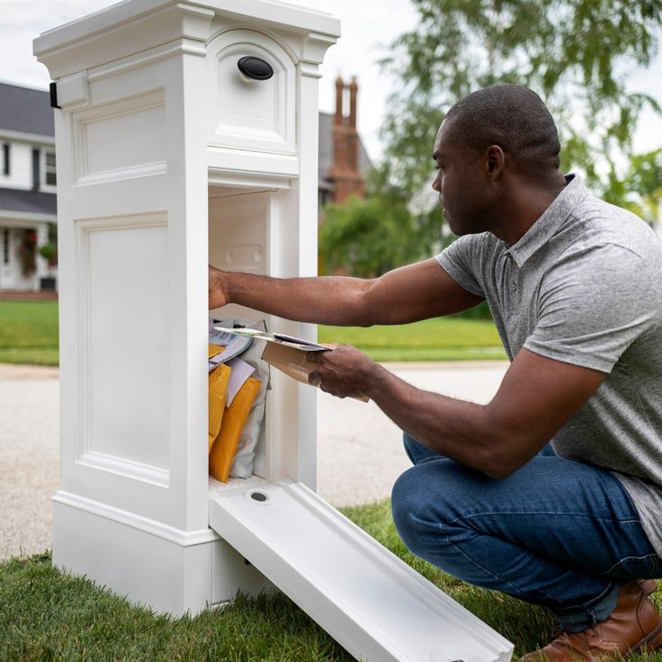 From street to front door your home’s curb appeal expresses both your personality and your home’s unique character. This season improve your home’s curb appeal with the simple update of your mailbox to one designed by Step2. This stately decorative mailbox with extra storage is quick to assemble for easy installation over a standard 4x4 wooden post. A removable floor covers a large 24 in. x 6 in. x 13 in. mail storage receptacle giving you the option for use as a standard mailbox or to add extra Farmhouse Mailboxes, Package Mailbox, Mailbox And Post, Rustic Mailboxes, Home Mailboxes, Brick Mailbox, Large Mailbox, Steel Mailbox, Diy Mailbox