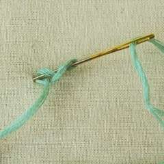 a crochet hook with yarn on it