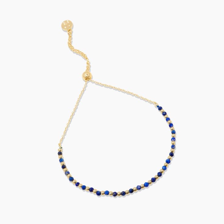 Everyday color - this updated take on our best-selling Power Gemstone Bracelet features classic gold beads and vibrant, meaningful gemstones. Wear solo, or pile them on for additional good energy. Lapis is known as a stone of wisdom. It supports mental clarity and openness guiding you to a deep inner knowing. Product Details Total length extends out to 9 1/4" Beads measure 1/16" and 1/8" Genuine gemstone lapis for wisdom Natural color and size may vary slightly Adjustable closure Available in 18 Adjustable Crystal Bangle Bracelet, Adjustable Beaded Stone Bracelets As Gifts, Adjustable Beaded Bracelets With Stones As Gift, Adjustable Beaded Stone Bracelets For Gift, Adjustable Beaded Bracelets With Stones For Gift, Elegant Friendship Bracelets With Adjustable Chain, Hand-strung Adjustable Chain Bracelet For Gift, Adjustable Hand-strung Chain Bracelet As Gift, Adjustable Multicolor Stone Bracelet