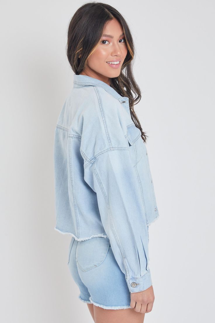 Add some edgy layers to your go-to outfits this season with our Women's Cropped Denim Jacket With Raw Hem. Complete with all standard trademarks: buttoned flap pockets, button-cuff long sleeves, exposed front button closure, basic collar, and a cropped fit with raw hem. Measurement (Based on size M) - Sleeve Length (From shoulder seam): 18” - Length: 21” - Chest: 22.5” Composition: - 81% Cotton/ 10% Polyester/ 9% Rayon • Machine wash cold. • Model is wearing a size S. Cropped Denim Jacket Outfit, Ymi Jeans, Denim Jacket Outfit, Blue Q, Cropped Denim Jacket, Denim Jacket Women, Cropped Denim, Medium Blue, Jacket Outfits