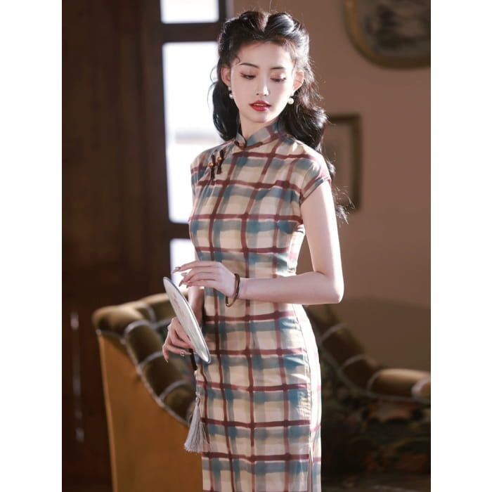 Vintage Checker Patterned Cheongsam Elevate your wardrobe with our elegant Vintage Checker Patterned Cheongsam. This traditional Chinese dress features a timeless checker pattern, adding a touch of sophistication to any occasion. Experience the luxury and beauty of this vintage-inspired piece. Size Chart (cm) Bust Waist Hip Dress Length Shoulder Width S 82 66 86 120 36 M 86 72 90 120 37 L 90 76 94 120 38 XL 94 80 98 120 39 2XL 98 84 102 120 40 Kawaii Swimsuit, Dark Academia Clothing, Anime Lingerie, Checker Pattern, Traditional Chinese Dress, Cottagecore Fashion, Kawaii Dress, Cute Outfits For School, Maid Dress