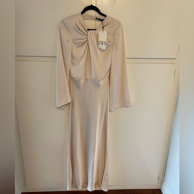 Zara Dress Spring Fitted Long Sleeve Evening Dress, Cream Midi Evening Dress, Cream Midi Length Evening Dress, Chic Cream Midi Dress For Evening, Chic Beige Evening Dress, Elegant Zara A-line Dress, Chic Beige Evening Dress For Spring, Cream Maxi Dress For Dinner, Chic Long Sleeve Satin Evening Dress