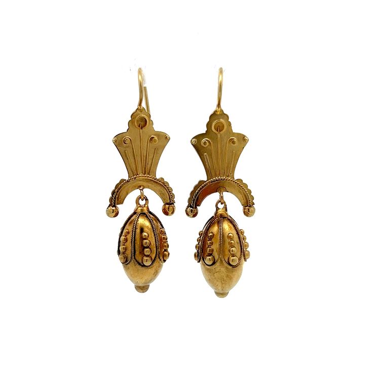 Antique Victorian Hollow Dangle Earrings in 15k Yellow Gold Step back in time with these exquisite Victorian drop earrings, truly a treasure from the 19th century. Crafted in 15 karat yellow gold, these antique earrings showcase the ornate detailing characteristic of the Victorian era. Each earring features intricate scrollwork and hollow elements that contribute to their lightweight feel, making them comfortable for all-day wear. These elegant drop earrings are perfect for anyone who appreciates the beauty of antique jewelry and the rich stories they hold. A timeless set of earrings that add a touch of history and elegance to any outfit! CHARACTERISTICS Measurements: 2 inches in length x 12.5 mm wide Era: Victorian/Antique Composition: 15 Karat Yellow Gold Total Gram Weight: 5.6 g - ALL P Luxury Victorian Yellow Gold Pearl Earrings, Luxury Yellow Gold Victorian Pearl Earrings, Classic 22k Gold Earrings, Antique Yellow Gold Ceremonial Earrings, Historical Yellow Gold Drop Earrings, Yellow Gold Historical Drop Earrings, Yellow Gold Drop Earrings With Historical Design, Victorian Yellow Gold Drop Earrings, Vintage Ceremonial Drop Earrings